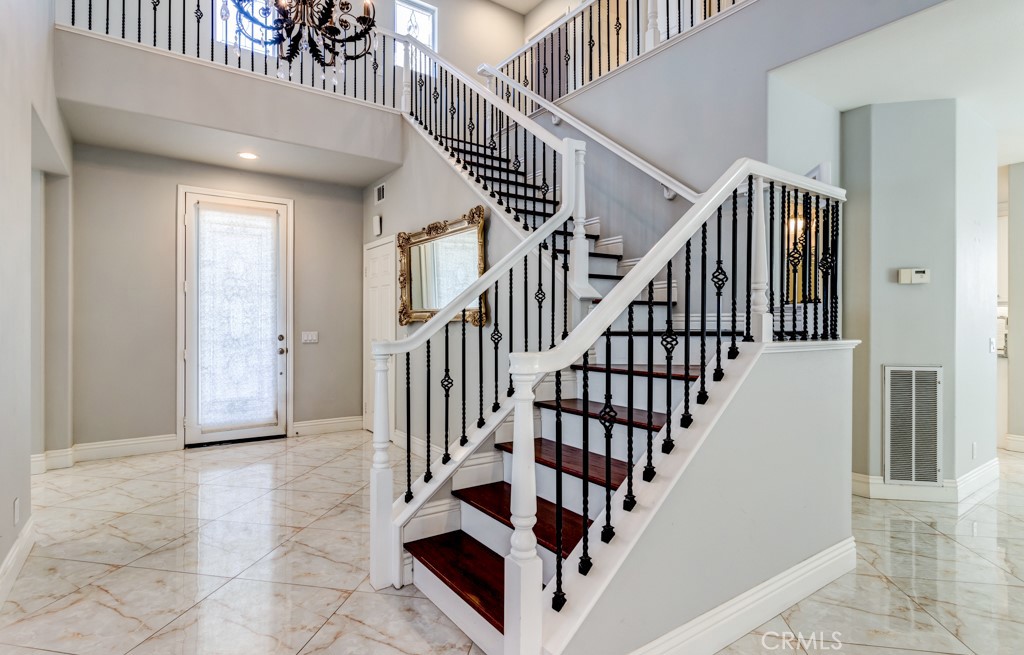 8 Zinnia Irvine, CA 92618 - Photo 28 of 63 a view of entryway and hall with wooden floor