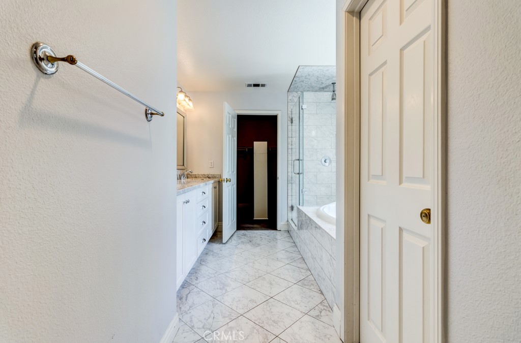 8 Zinnia Irvine, CA 92618 - Photo 36 of 63 a view of a hallway with white walls