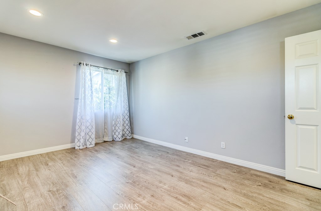 8 Zinnia Irvine, CA 92618 - Photo 40 of 63 a view of entryway with wooden floor