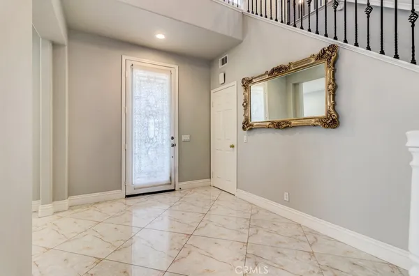 a view of a door with wooden floor