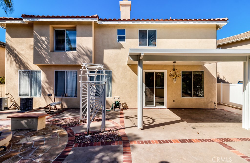 8 Zinnia Irvine, CA 92618 - Photo 49 of 63 a front view of a house with a porch