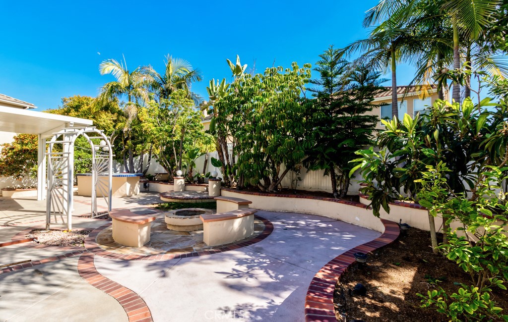 8 Zinnia Irvine, CA 92618 - Photo 50 of 63 a view of a swimming pool with a patio