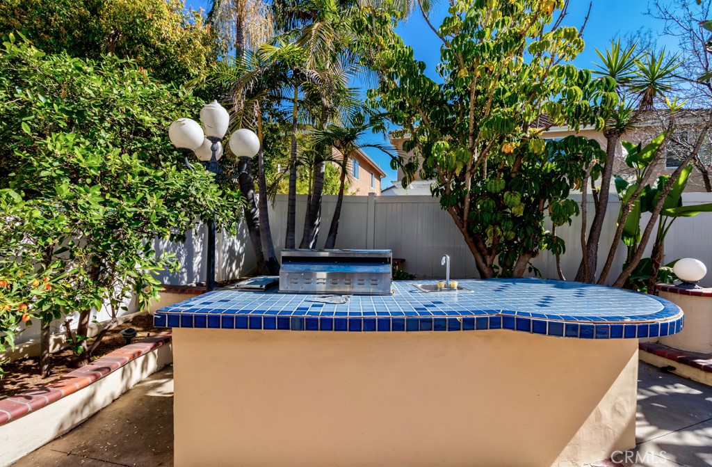 8 Zinnia Irvine, CA 92618 - Photo 53 of 63 a view of a house with a yard and sitting area