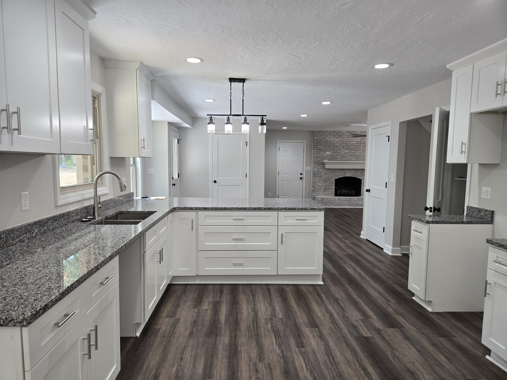 7 Bush Court Waverly, TN 37185 - Photo 17 of 48 a large kitchen with a large counter top appliances and cabinets