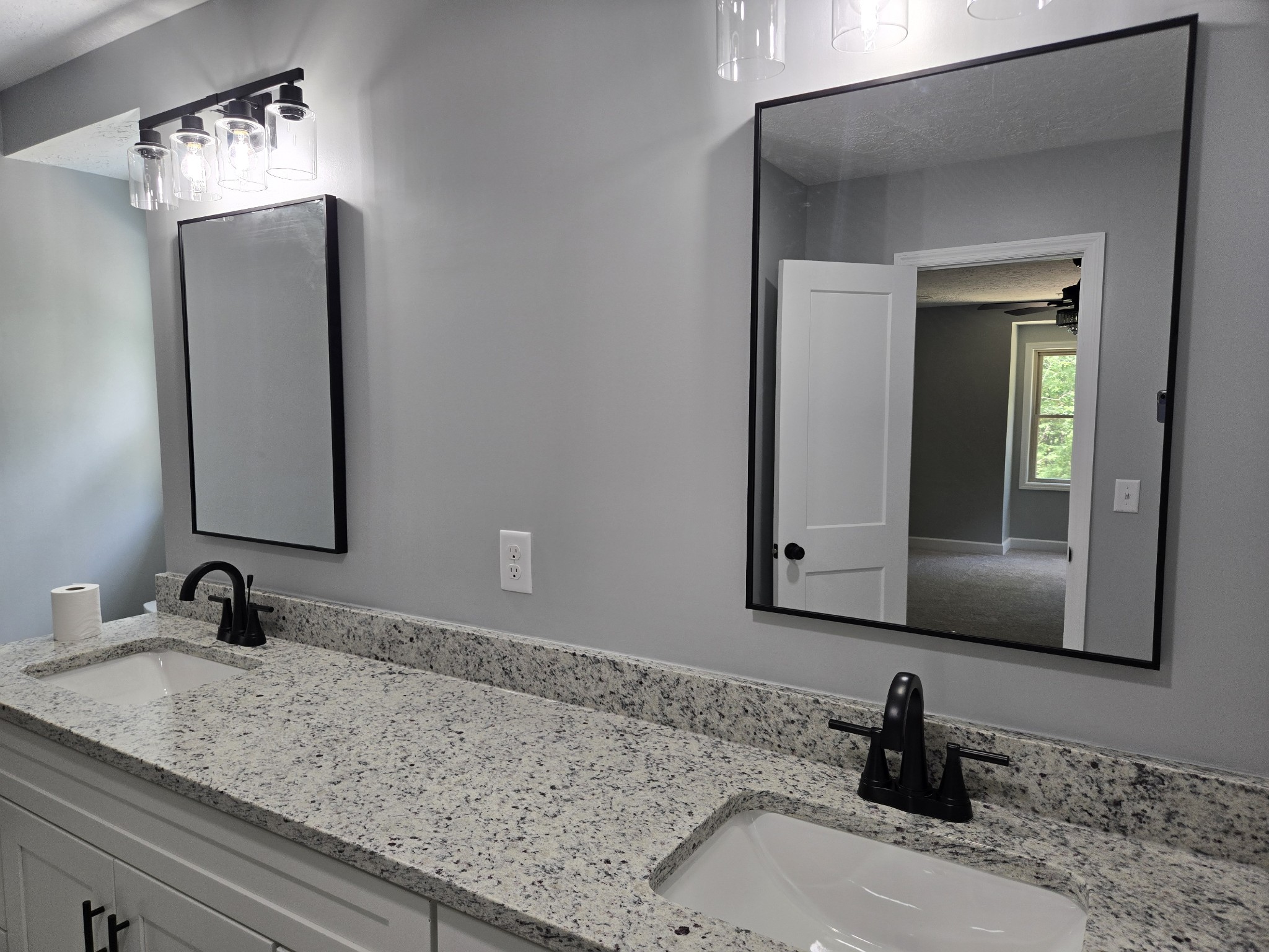 7 Bush Court Waverly, TN 37185 - Photo 36 of 48 a bathroom with sink and mirror