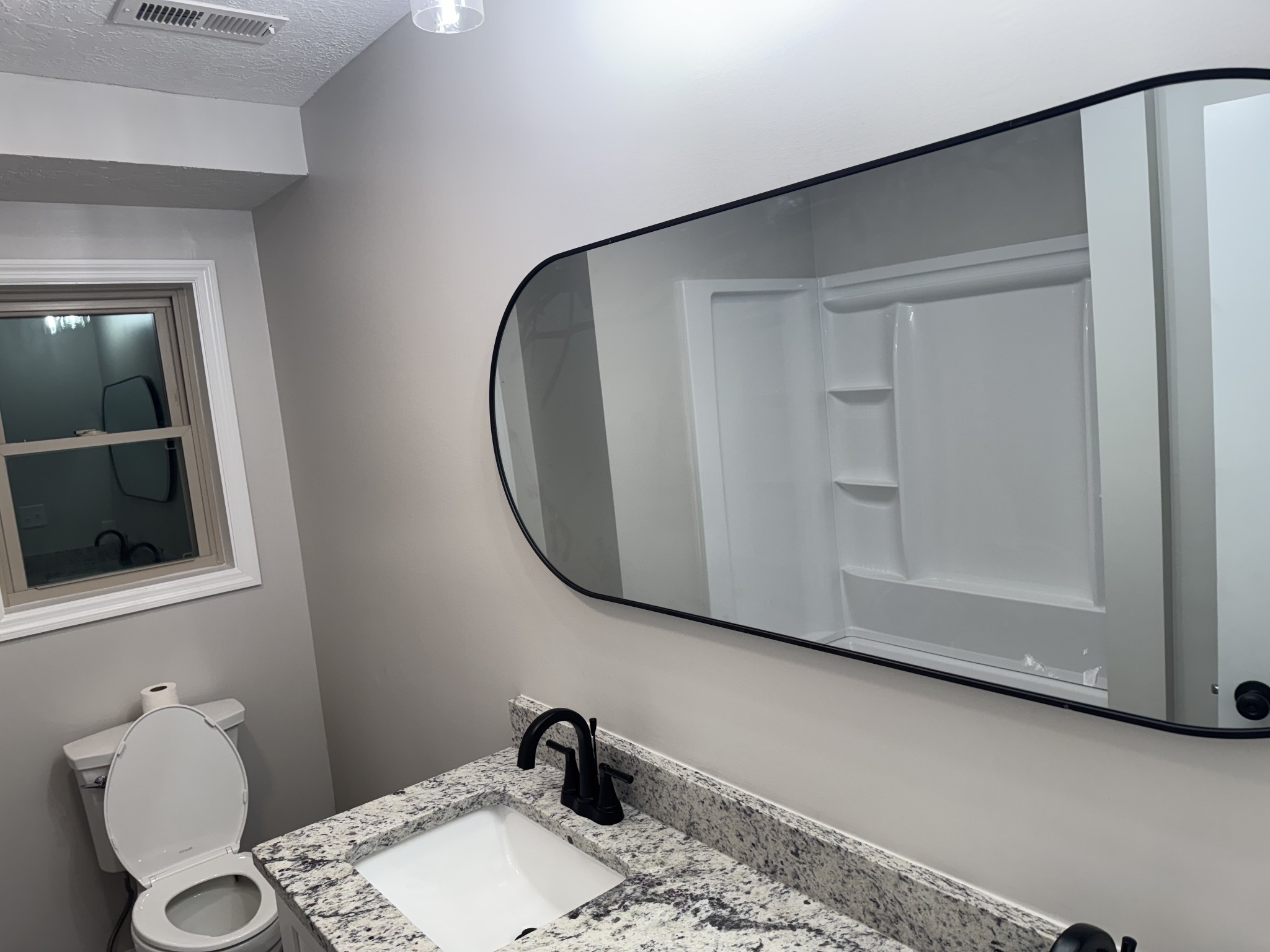7 Bush Court Waverly, TN 37185 - Photo 37 of 48 a bathroom with a sink and a mirror