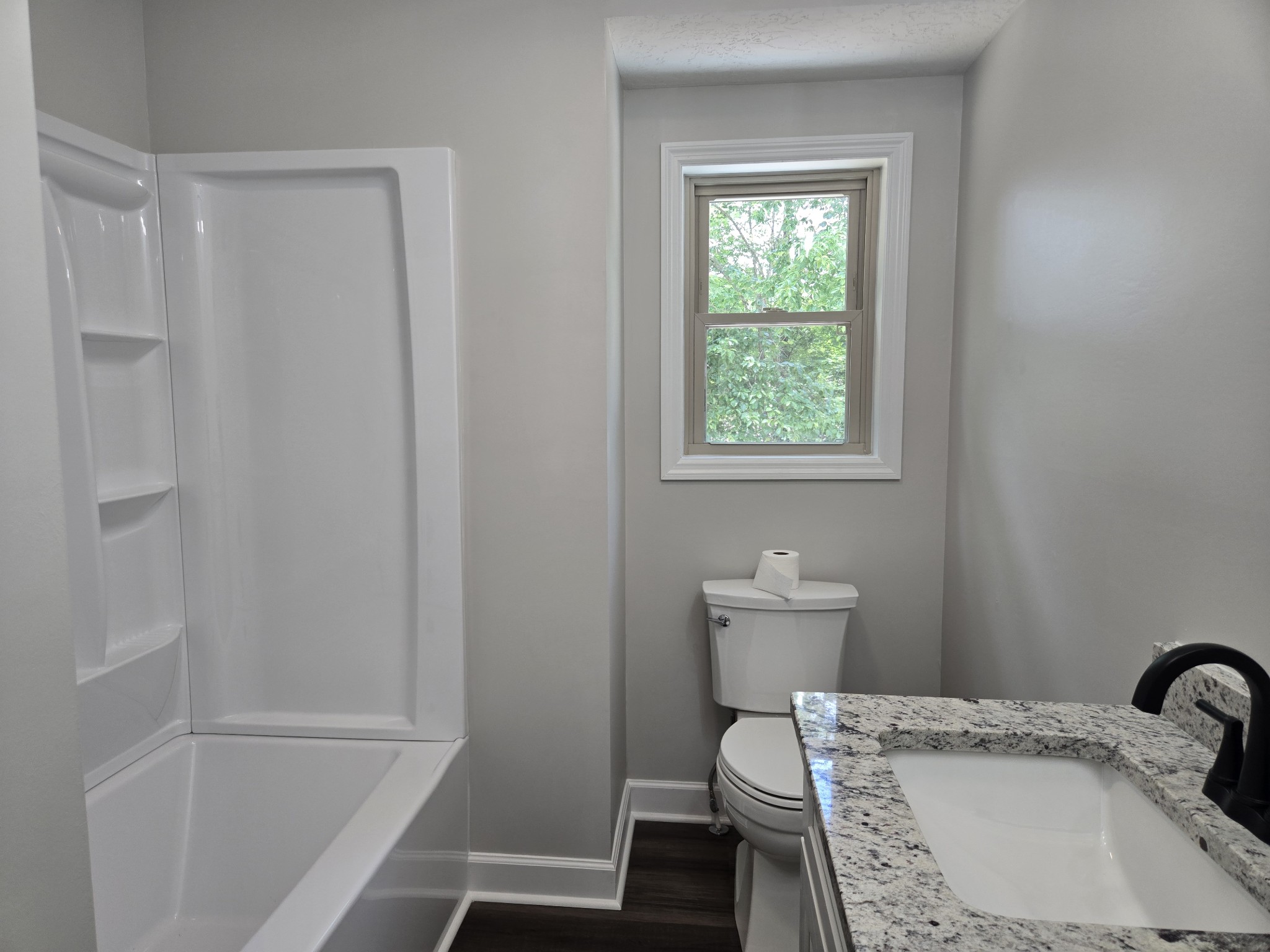7 Bush Court Waverly, TN 37185 - Photo 38 of 48 a bathroom with a sink toilet and shower