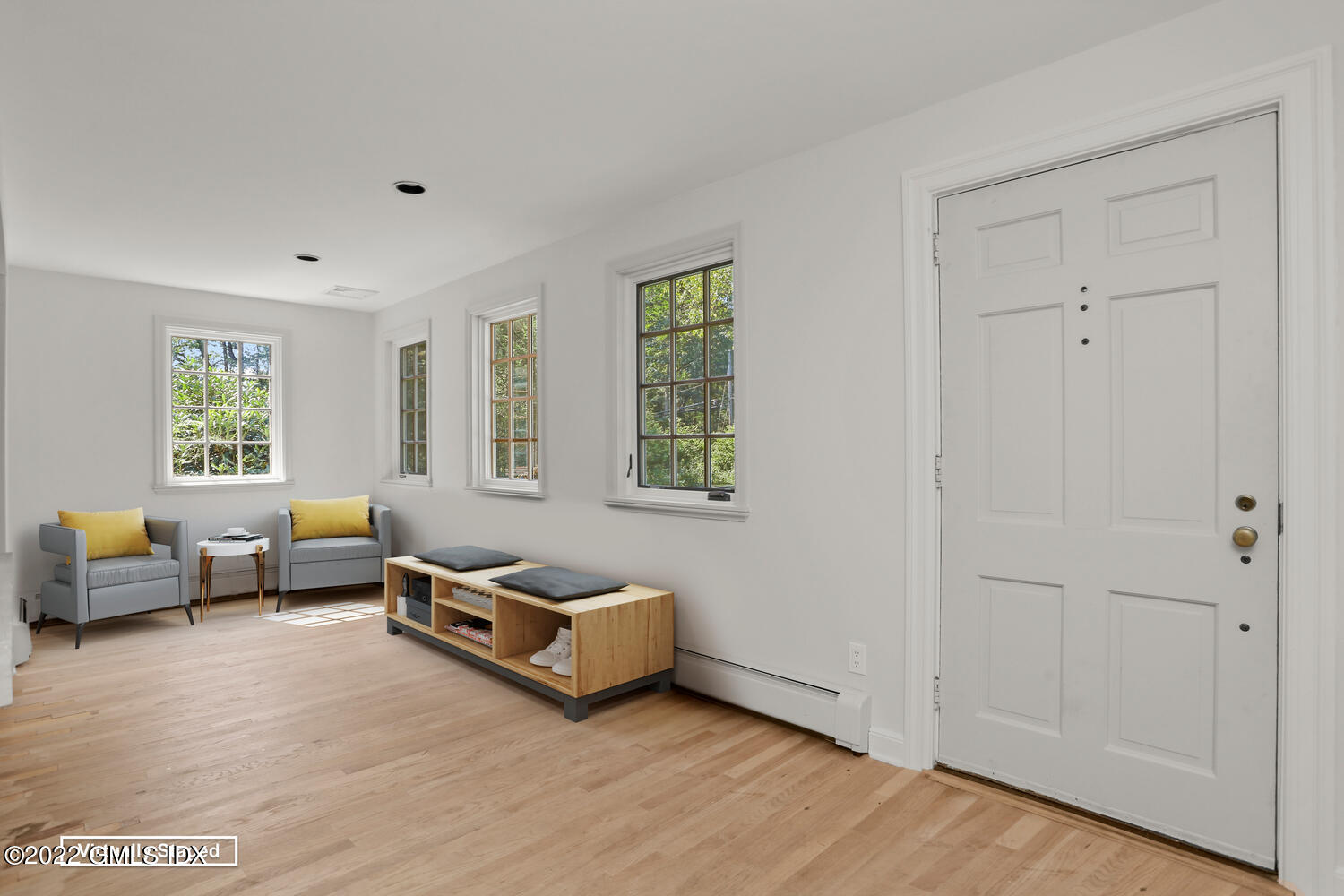 229 Cognewaugh Road Cos Cob, CT 06807 - Photo 3 of 24 a living room with furniture and windows
