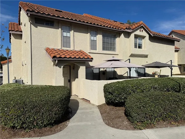 a front view of a house with porch
