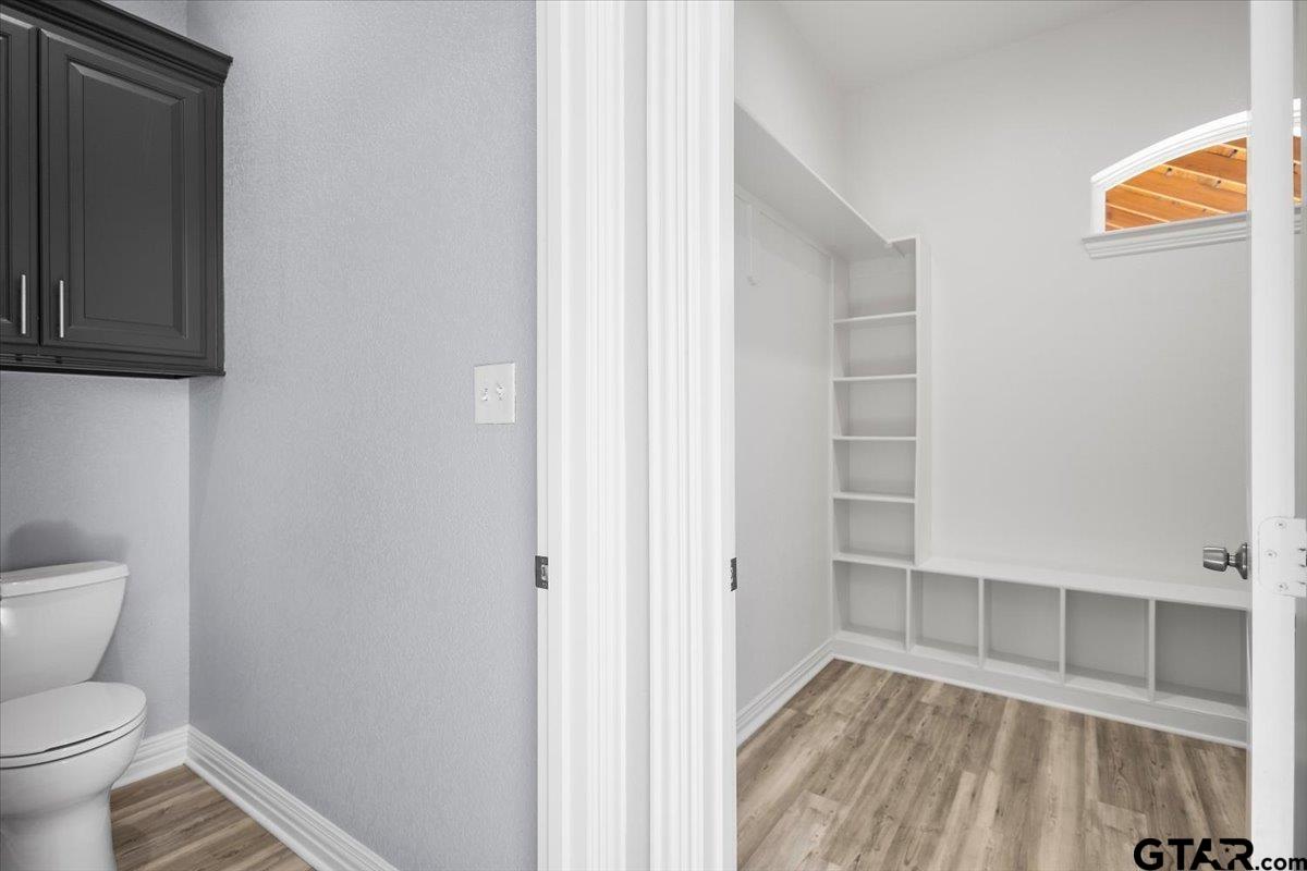 9629 Matise Street Tyler, TX 75706 - Photo 25 of 48 a bathroom with a toilet and a shower