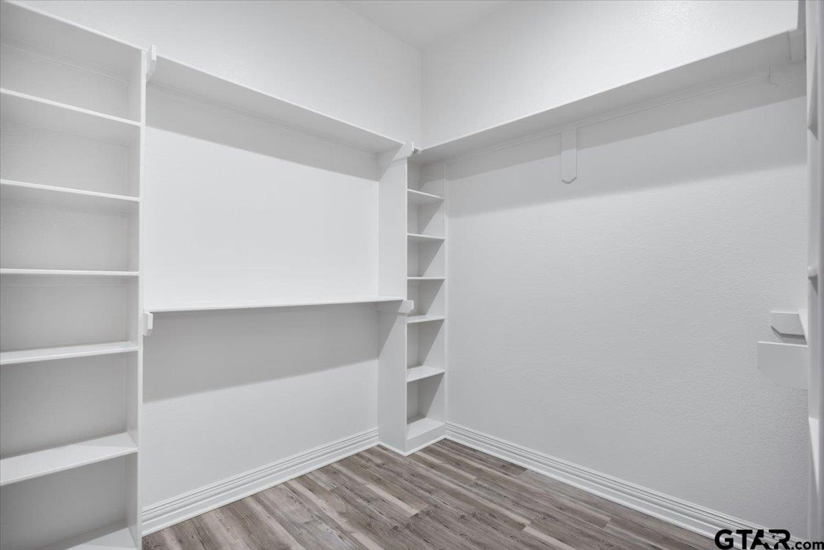 9629 Matise Street Tyler, TX 75706 - Photo 27 of 48 a view of an empty walk in closet