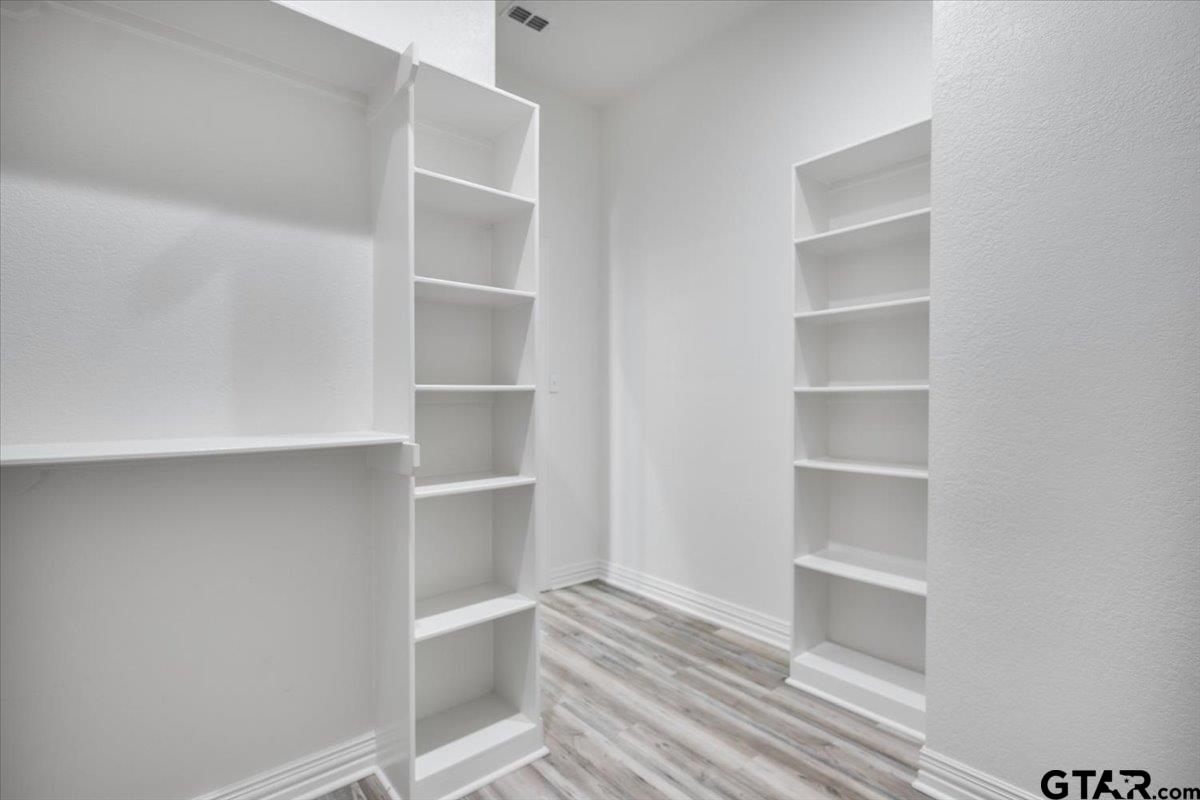 9629 Matise Street Tyler, TX 75706 - Photo 28 of 48 a view of a room with rack on the wall