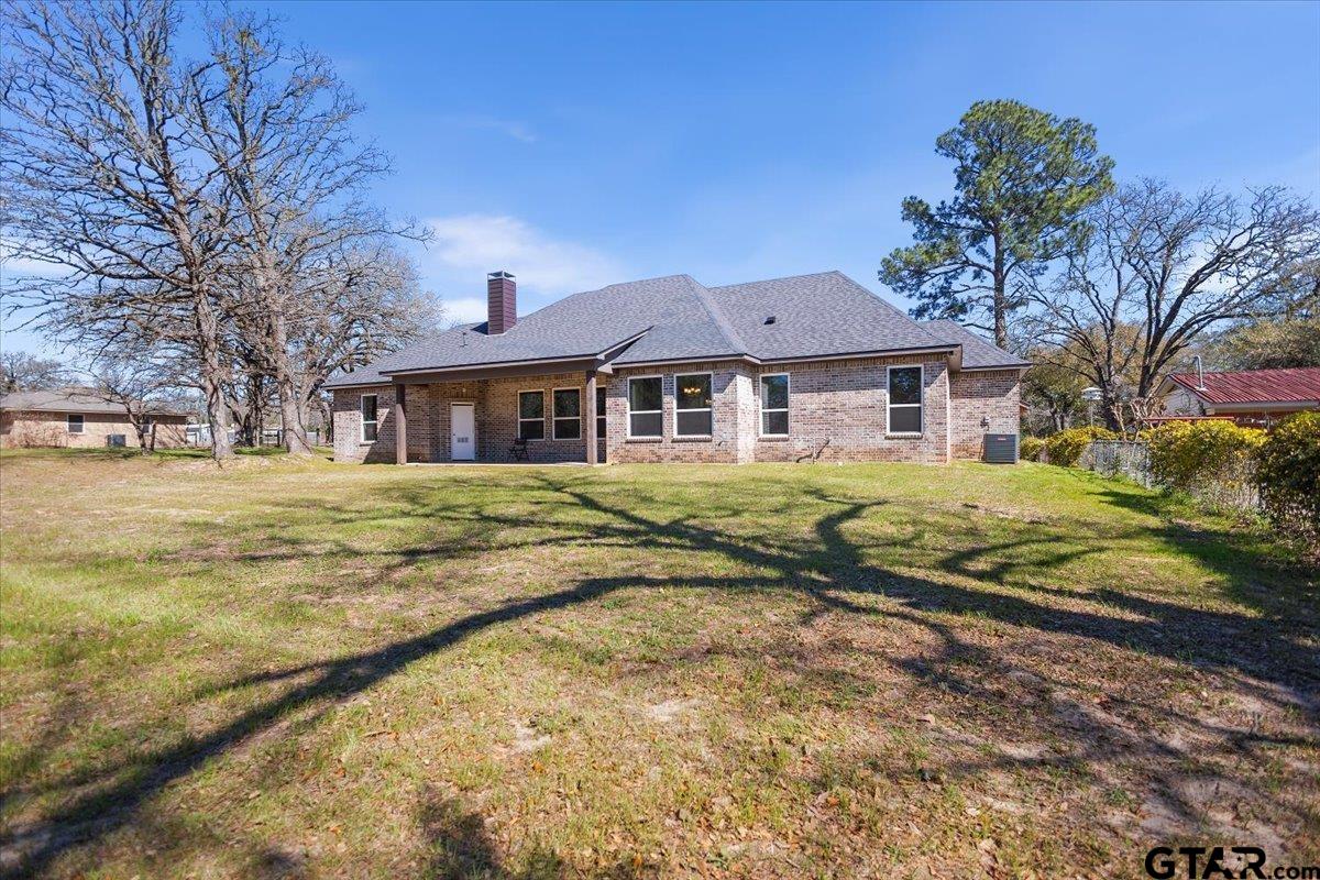 9629 Matise Street Tyler, TX 75706 - Photo 47 of 48 a front view of a house with a yard