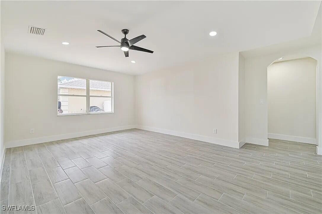 4733 28th Street Southwest Lehigh Acres, FL 33973 - Photo 9 of 10 Living Room