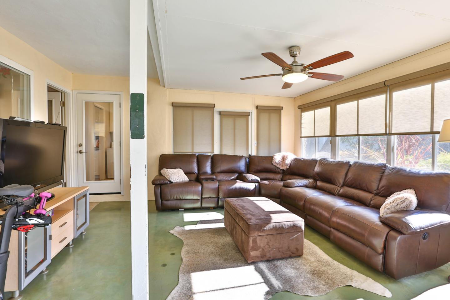 1762 Hallmark Lane San Jose, CA 95124 - Photo 13 of 39 a living room with furniture and a flat screen tv