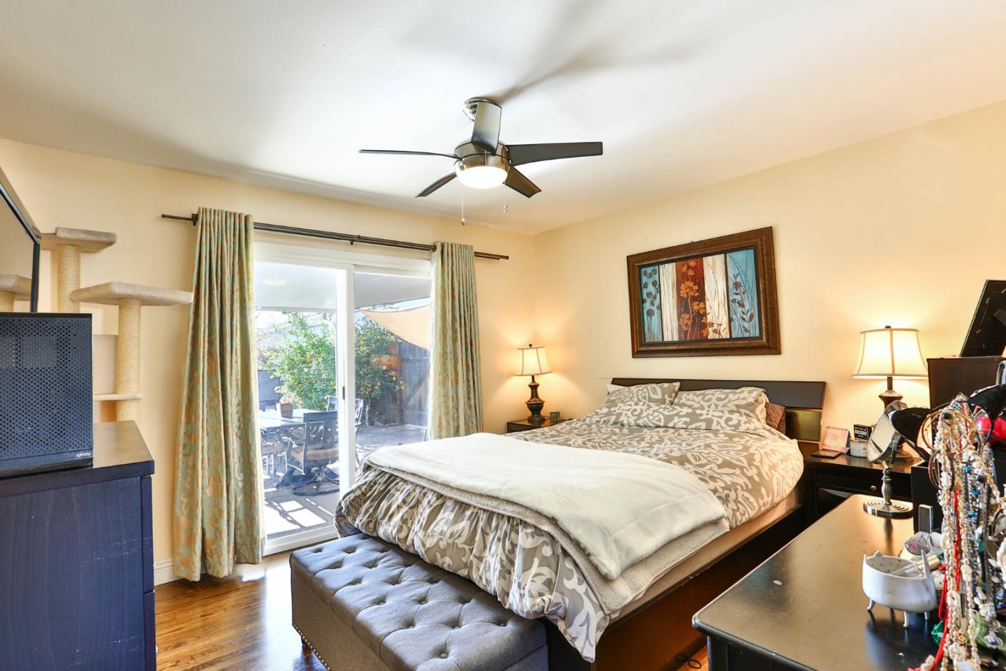 1762 Hallmark Lane San Jose, CA 95124 - Photo 17 of 39 a bedroom with a bed mirror and a large window