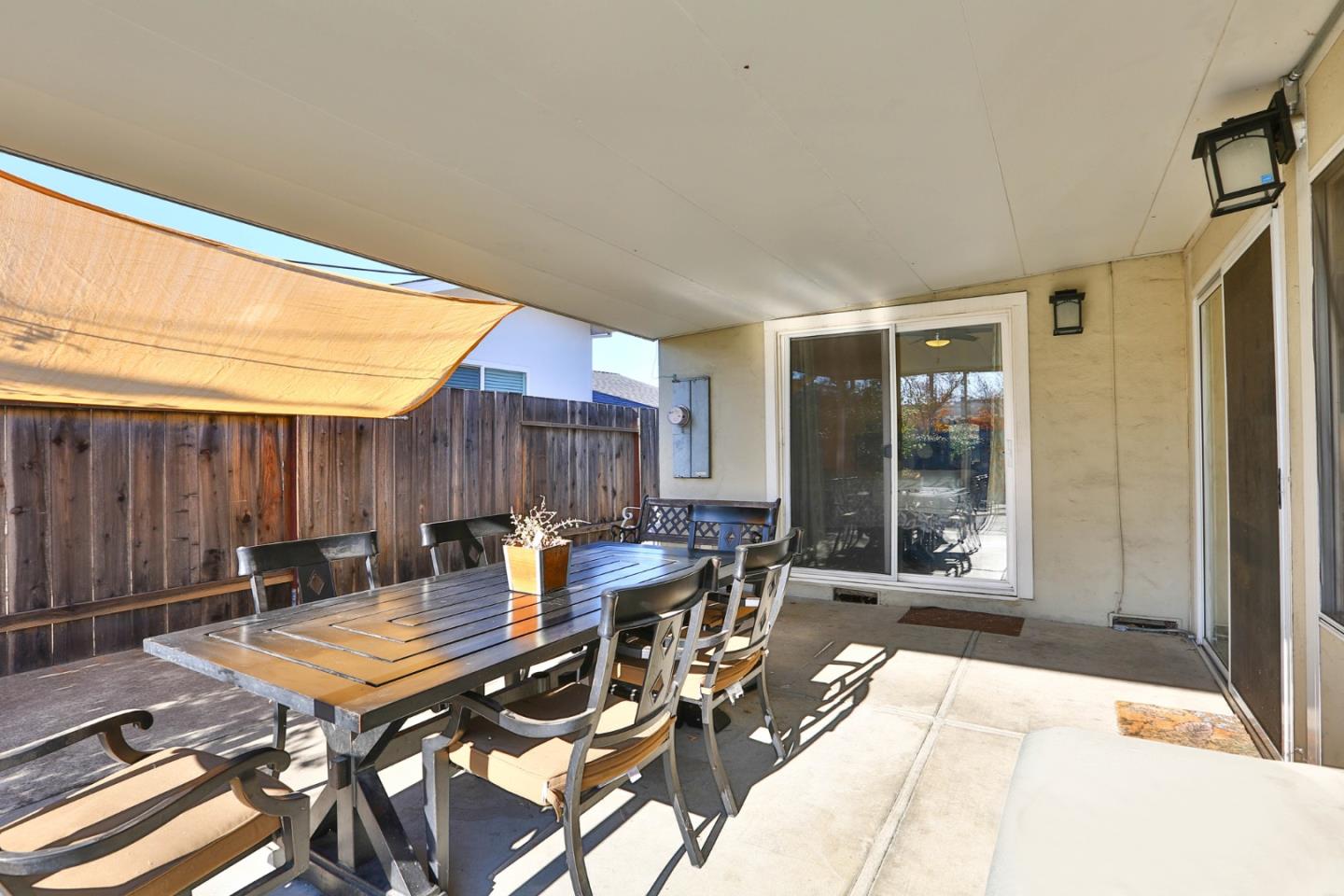 1762 Hallmark Lane San Jose, CA 95124 - Photo 22 of 39 a living room with furniture a table and a potted plant