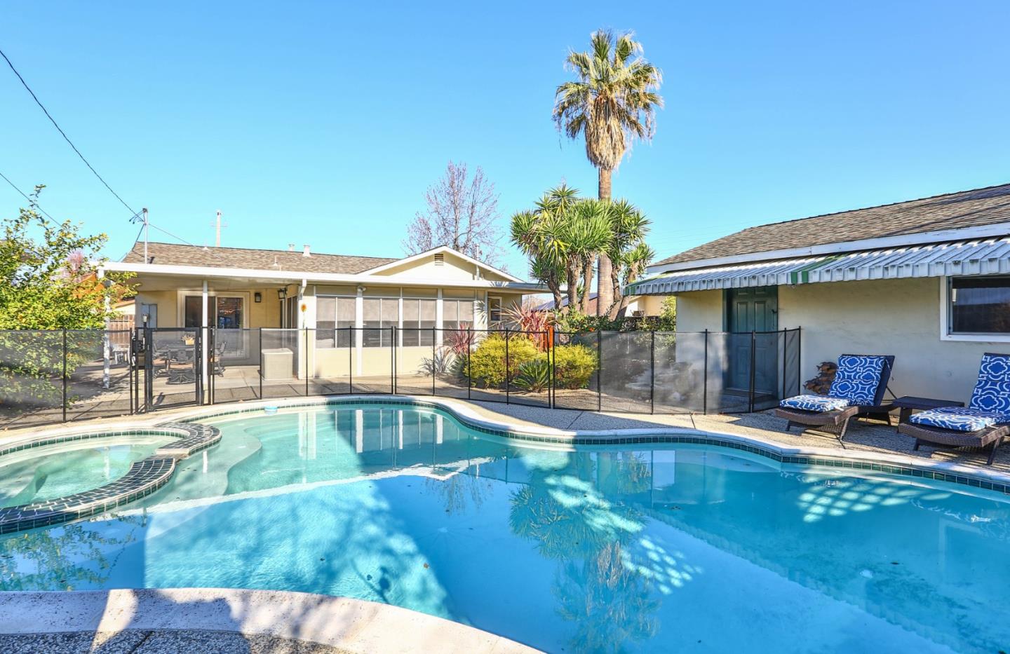 1762 Hallmark Lane San Jose, CA 95124 - Photo 32 of 39 a view of a house with swimming pool and sitting area