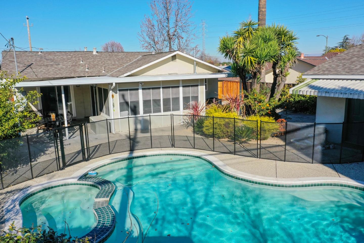 1762 Hallmark Lane San Jose, CA 95124 - Photo 34 of 39 a view of a house with a swimming pool