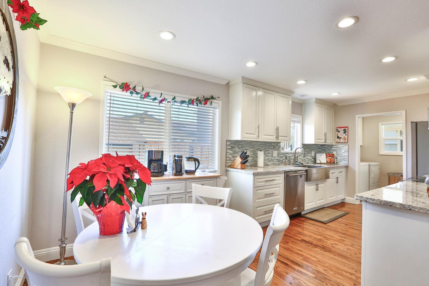 1762 Hallmark Lane San Jose, CA 95124 - Photo 5 of 39 a kitchen with a sink stove and kitchen island