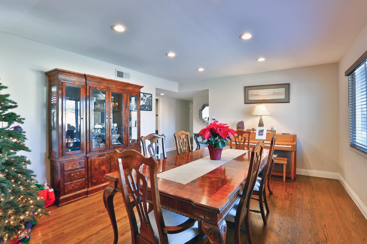 1762 Hallmark Lane San Jose, CA 95124 - Photo 8 of 39 a view of a dining room with furniture window and wooden floor