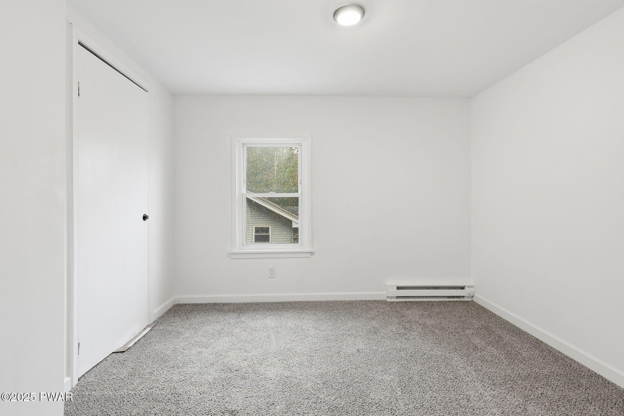 74 Charles Street Hawley, PA 18428 - Photo 20 of 40 an empty room with a window