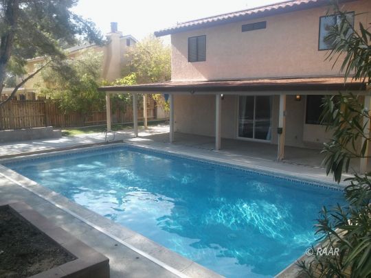 812 Bryann Street Ridgecrest, CA 93555 - Photo 28 of 34 a view of a house with a yard