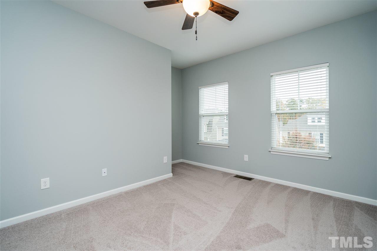 1539 Rodessa Run Raleigh, NC 27607 - Photo 21 of 25 a view of an empty room with a window