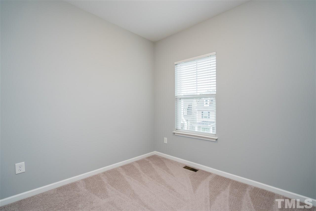 1539 Rodessa Run Raleigh, NC 27607 - Photo 23 of 25 an empty room with windows