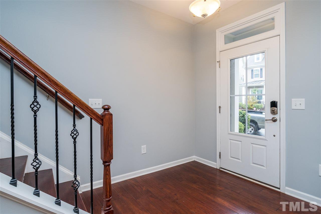 1539 Rodessa Run Raleigh, NC 27607 - Photo 4 of 25 a view of an entryway with wooden floor