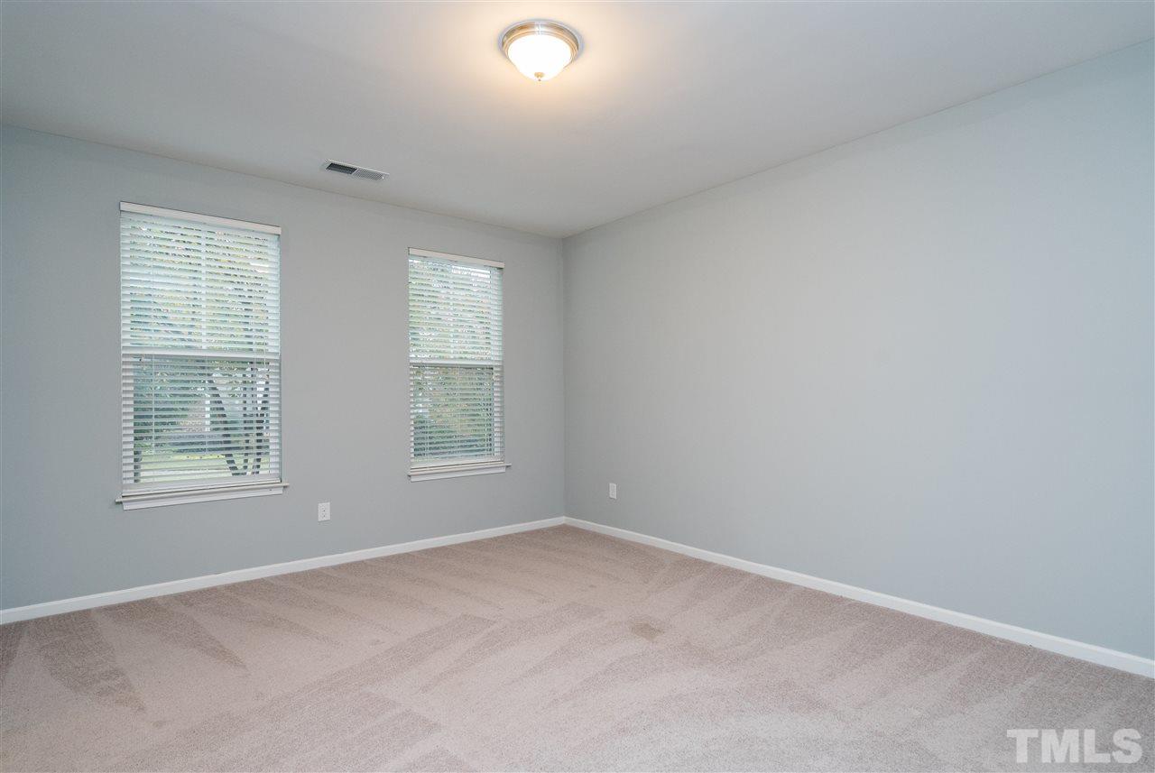 1539 Rodessa Run Raleigh, NC 27607 - Photo 5 of 25 an empty room with windows