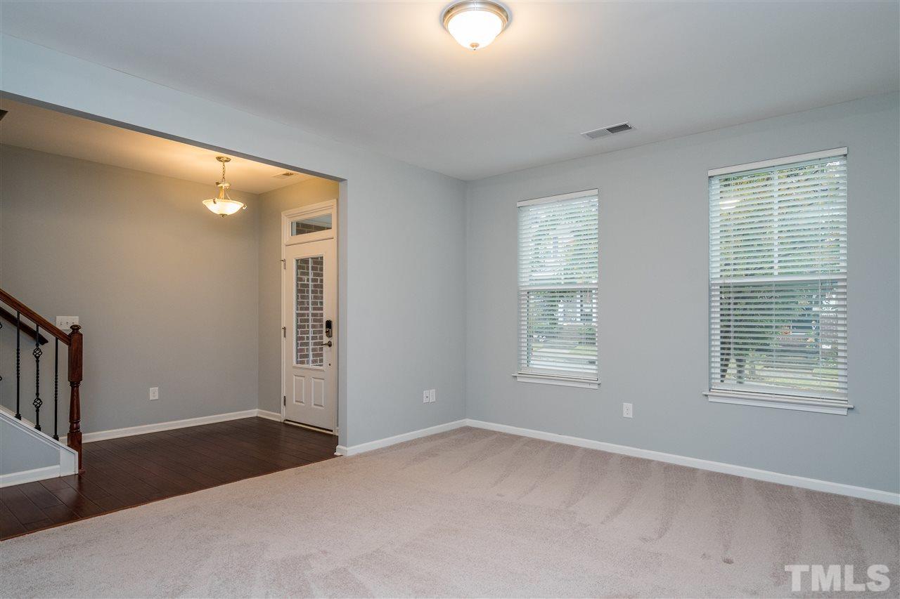1539 Rodessa Run Raleigh, NC 27607 - Photo 6 of 25 a view of an empty room with window and closet area