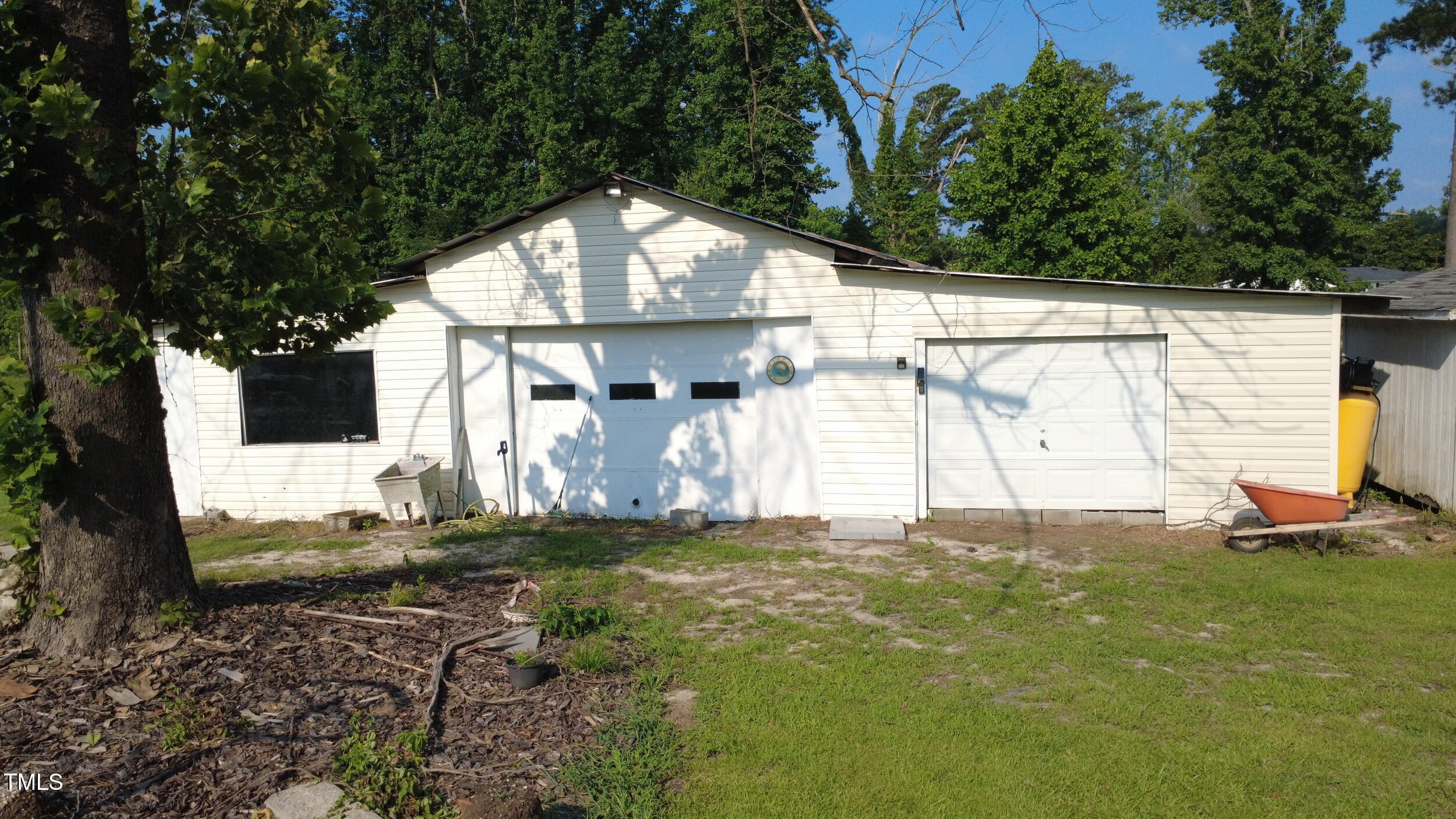1384 Niagara Carthage Road Carthage, NC 28327 - Photo 53 of 59 a view of a house with a yard
