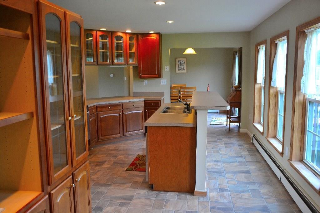 219 Range Road Cumberland, ME 04021 - Photo 6 of 21 Sunny kitchen with breakfast bar,...