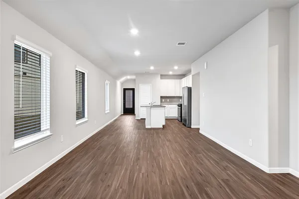 a view of kitchen with wooden floor