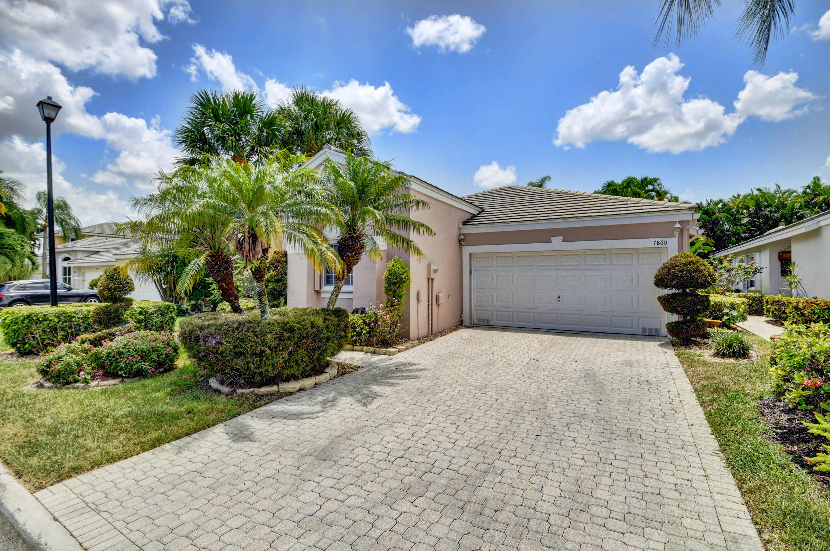 7860 Travelers Tree Drive Boca Raton, FL 33433 - Photo 1 of 35 front