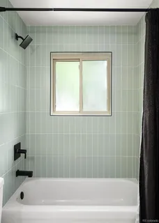 a bathroom with a bathtub