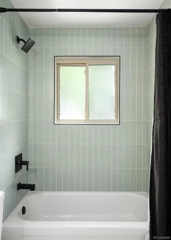 a bathroom with a bathtub