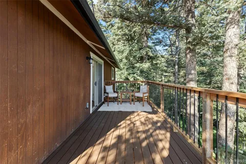 a view of balcony with a wooden floor