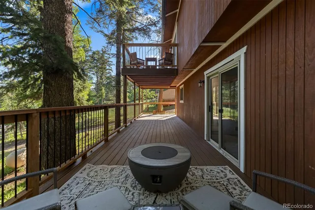 a front view of a house with parking space