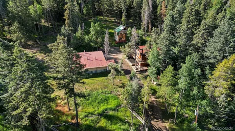 a view of a patio in backyard