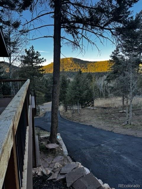 19424 Silver Ranch Road Conifer, CO 80433 - Photo 40 of 43 a view of a patio in backyard
