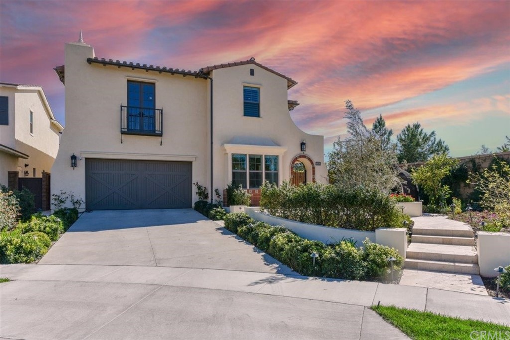 134 Paxton Irvine, CA 92620 - Photo 1 of 51 a front view of a house with a garden
