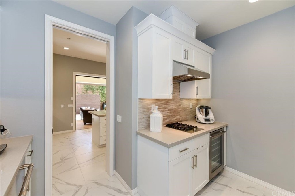 134 Paxton Irvine, CA 92620 - Photo 16 of 51 a kitchen with stainless steel appliances granite countertop a sink and cabinets