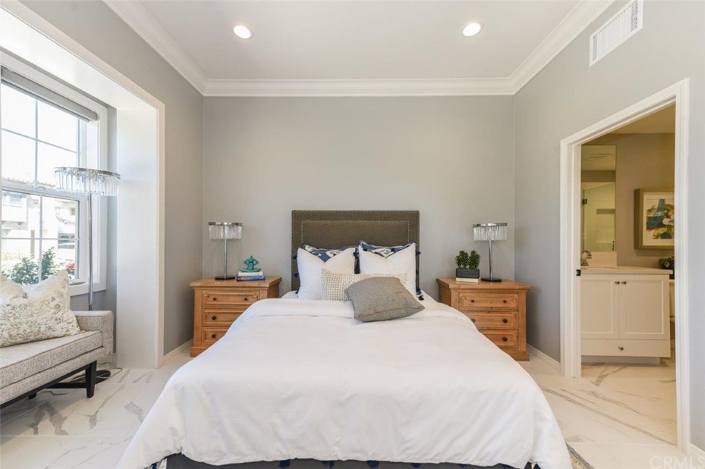 134 Paxton Irvine, CA 92620 - Photo 19 of 51 a bedroom with a bed and wooden floor