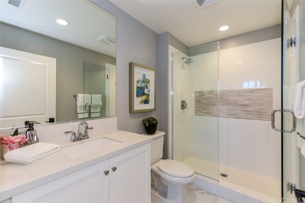 134 Paxton Irvine, CA 92620 - Photo 21 of 51 a bathroom with a sink a toilet and shower