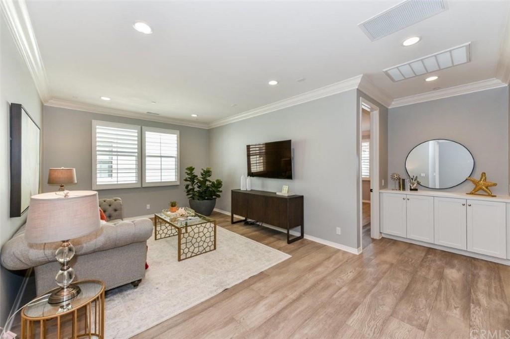 134 Paxton Irvine, CA 92620 - Photo 23 of 51 a living room with furniture and a flat screen tv