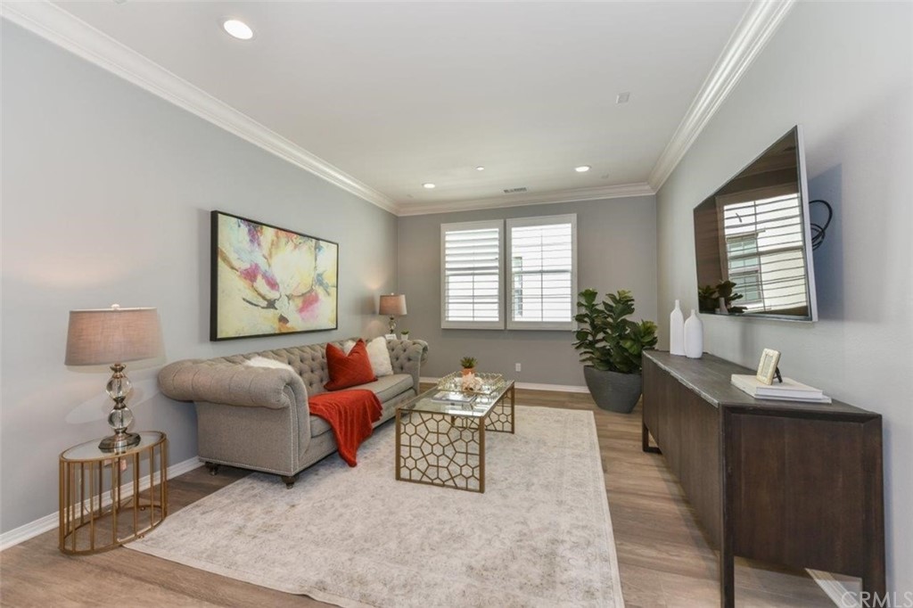 134 Paxton Irvine, CA 92620 - Photo 25 of 51 a living room with furniture and a flat screen tv
