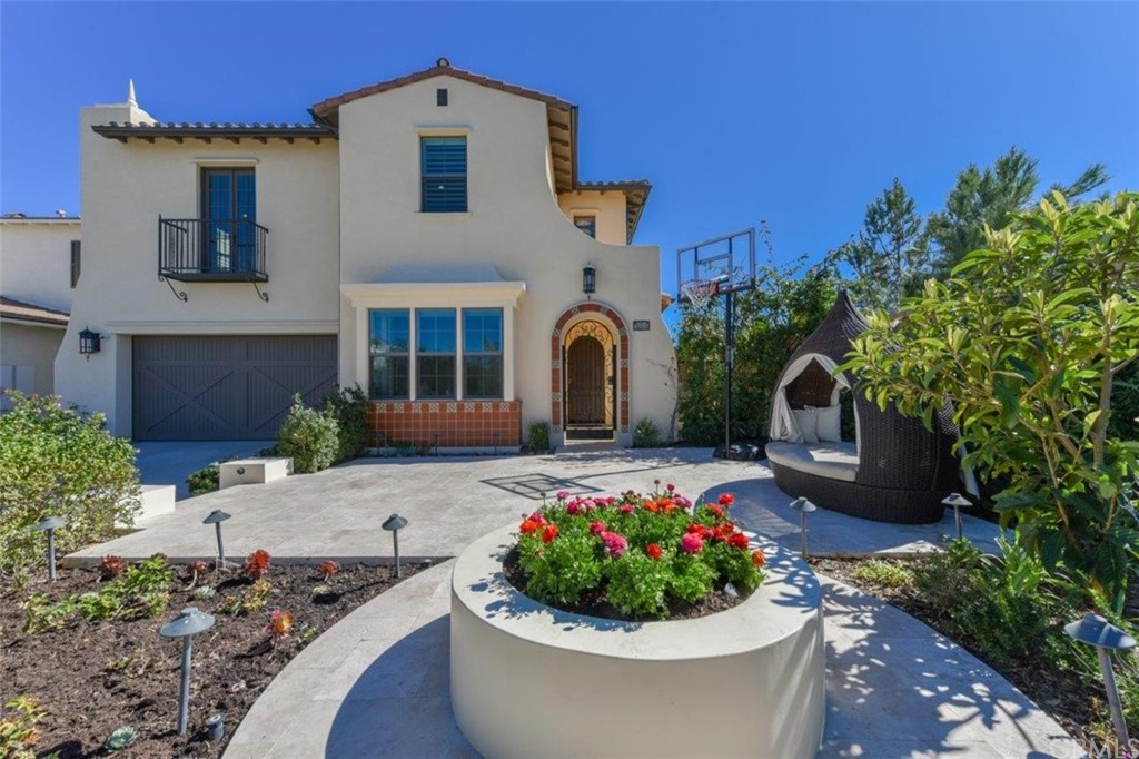 134 Paxton Irvine, CA 92620 - Photo 3 of 51 a front view of a house with a garden