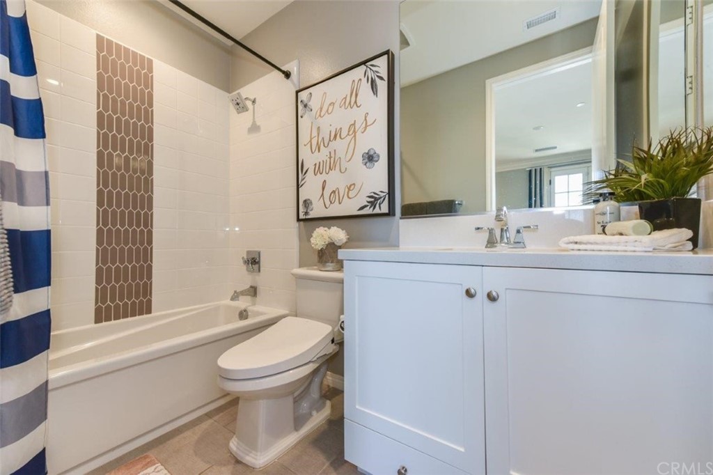 134 Paxton Irvine, CA 92620 - Photo 32 of 51 a bathroom with a sink a toilet and shower